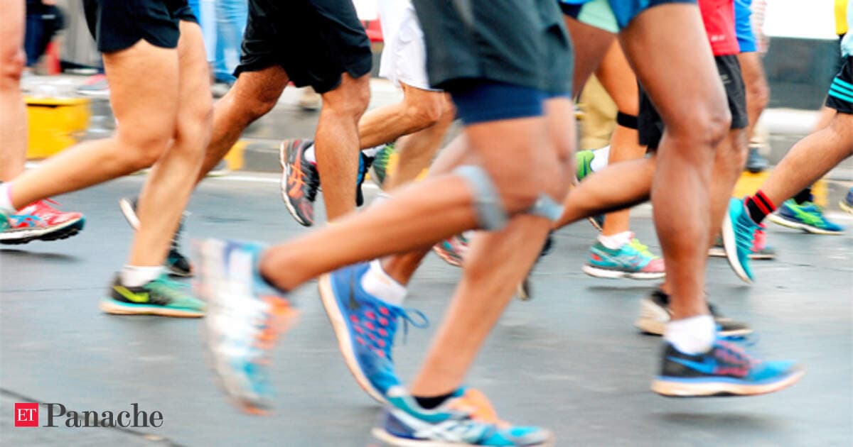 Economic Times article image for the marathon running feature quoting Dr. Godbole